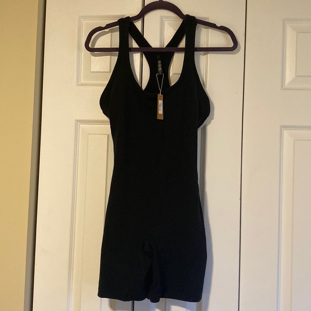 SKIMS Mid thigh Outdoor bodysuit in Onyx.